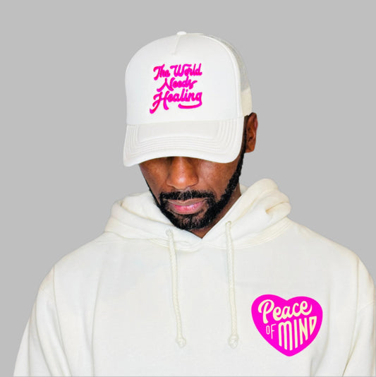 World Needs Healing Trucker Hat Cream